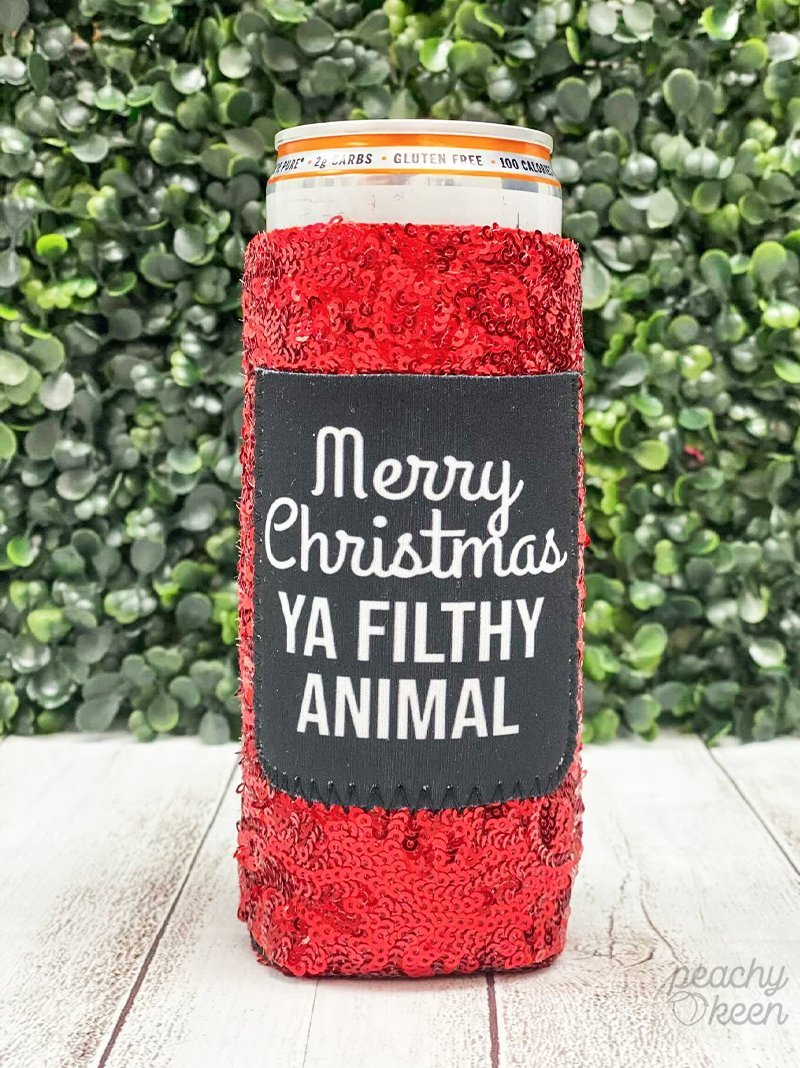 PEACHY KEEN MERRY CHRISTMAS YA FILTHY ANIMAL SEQUIN CAN COOLERS FOR SLIM CAN